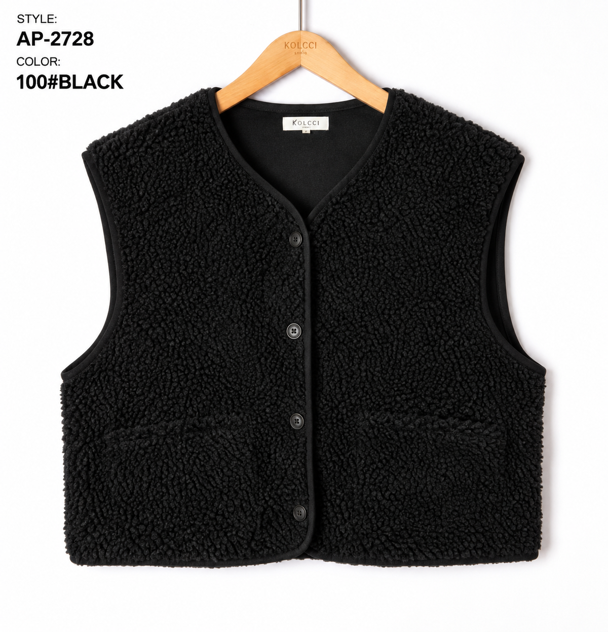 Zacht teddy gilet Kimberly zwart met knoopsluiting en steekzakken.”